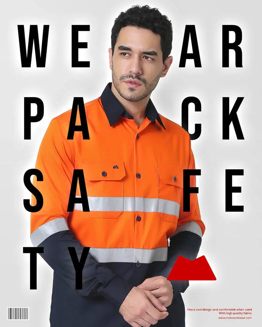 Man wearing orange and navy high-visibility workwear shirt with reflective stripes on white background