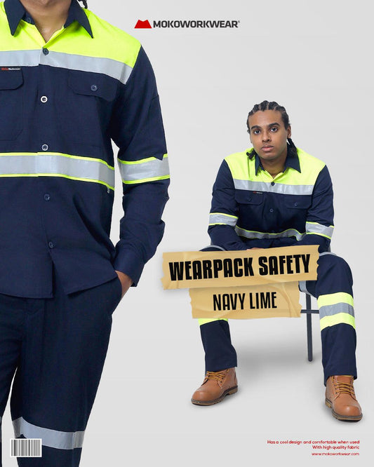Man in navy lime safety workwear with reflective stripes sitting on chair, MOKOWORKWEAR logo