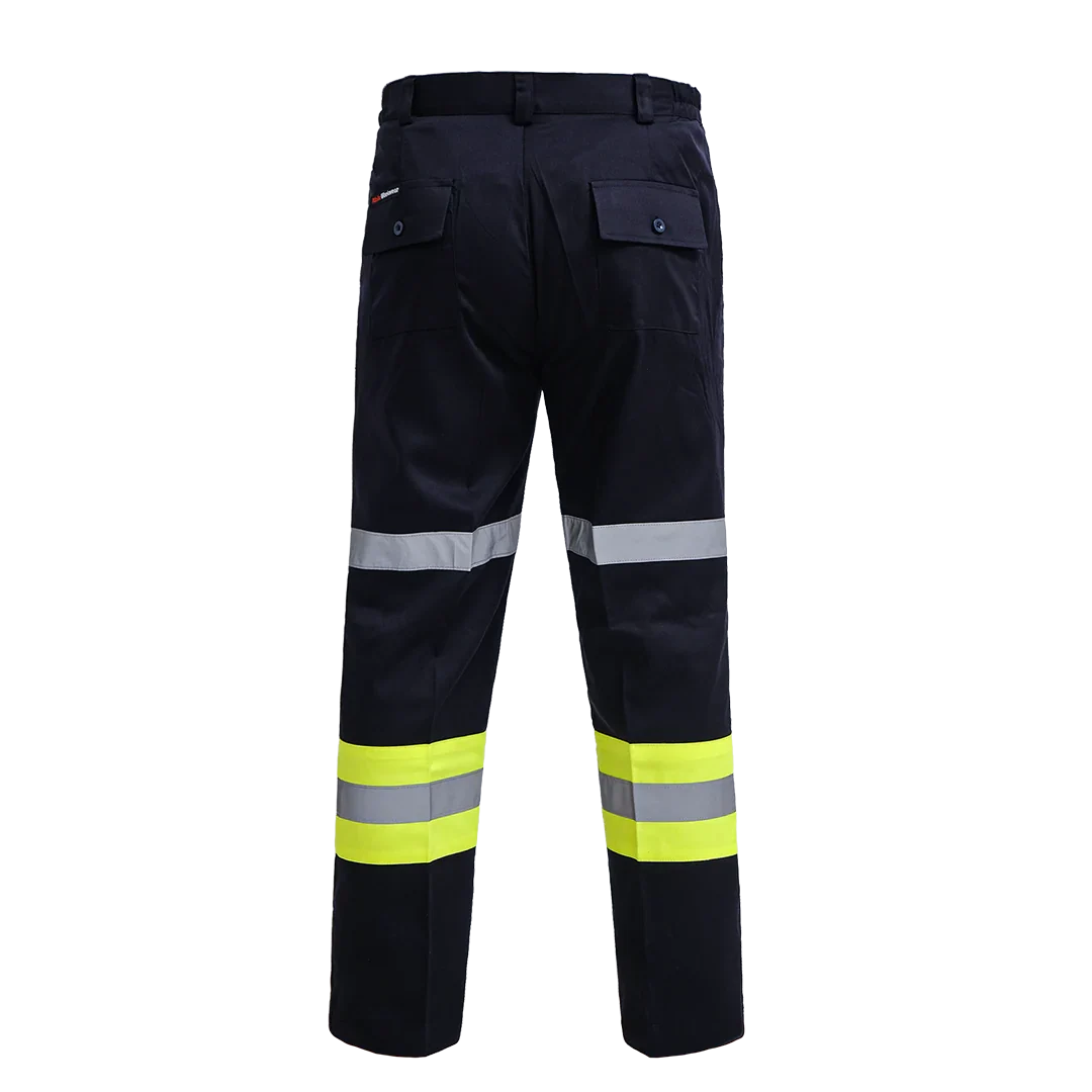 Back view of black work pants with reflective grey and yellow high-visibility bands and buttoned pockets
