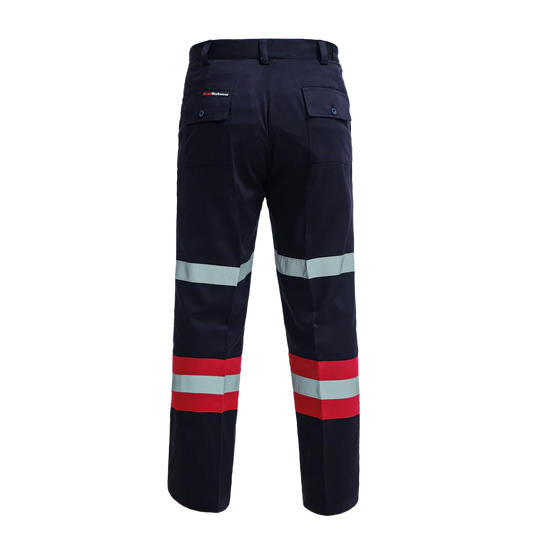 Rear view of navy blue work pants with red and reflective safety stripes and back pockets