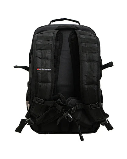 Black tactical backpack with padded shoulder straps and MOLLE webbing, designed for outdoor and workwear use
